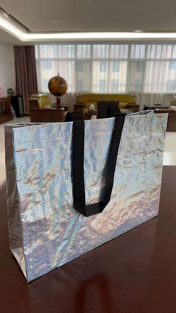 RGS PACKAGING's nieuwe laserfilm geweven draagtas